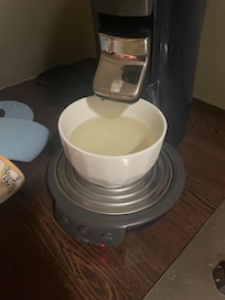 Dirty coffee water out of coffee machine