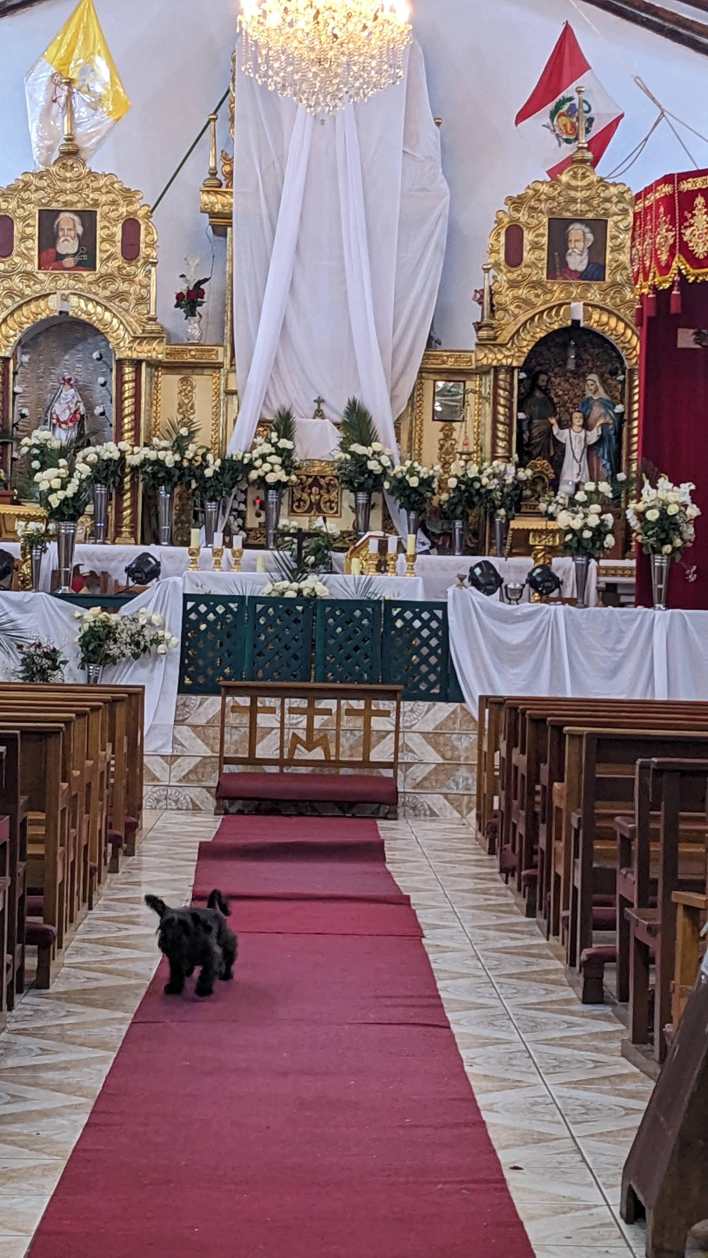 Small respectable Aguas Calientes church at the square