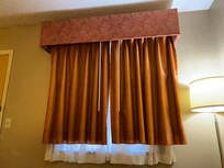 Curtain too short.
