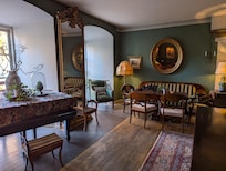 Expansive shared living room on the ground floor of the guestroom wing. Coffee, tea & cookies are available 24/7 here.