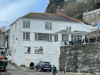 Inn pictured from the cove