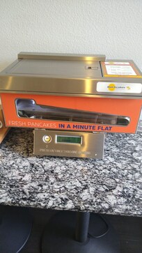 Máquina de panqueca no café da manhã