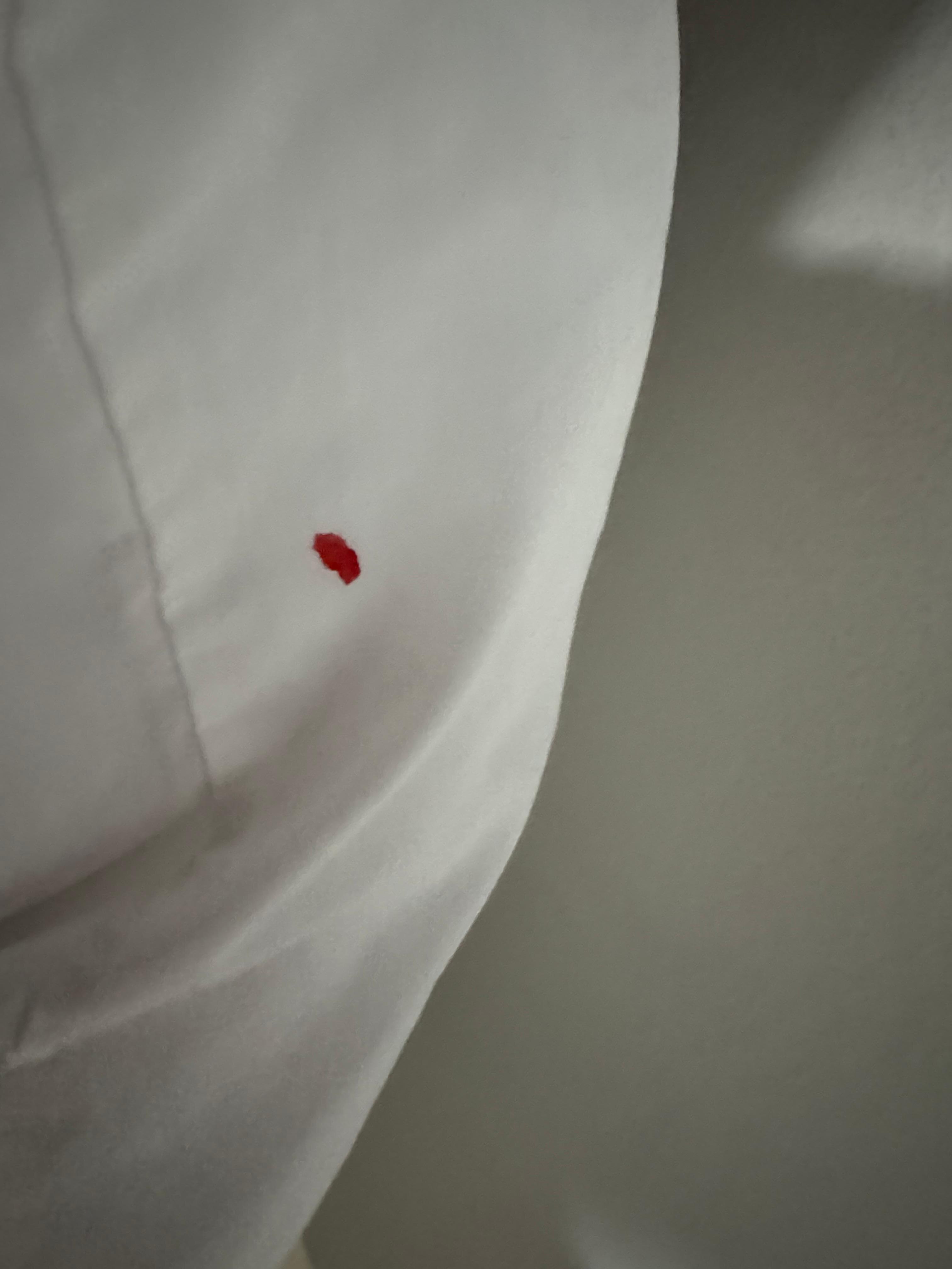 Fresh blood on pillowcase. 