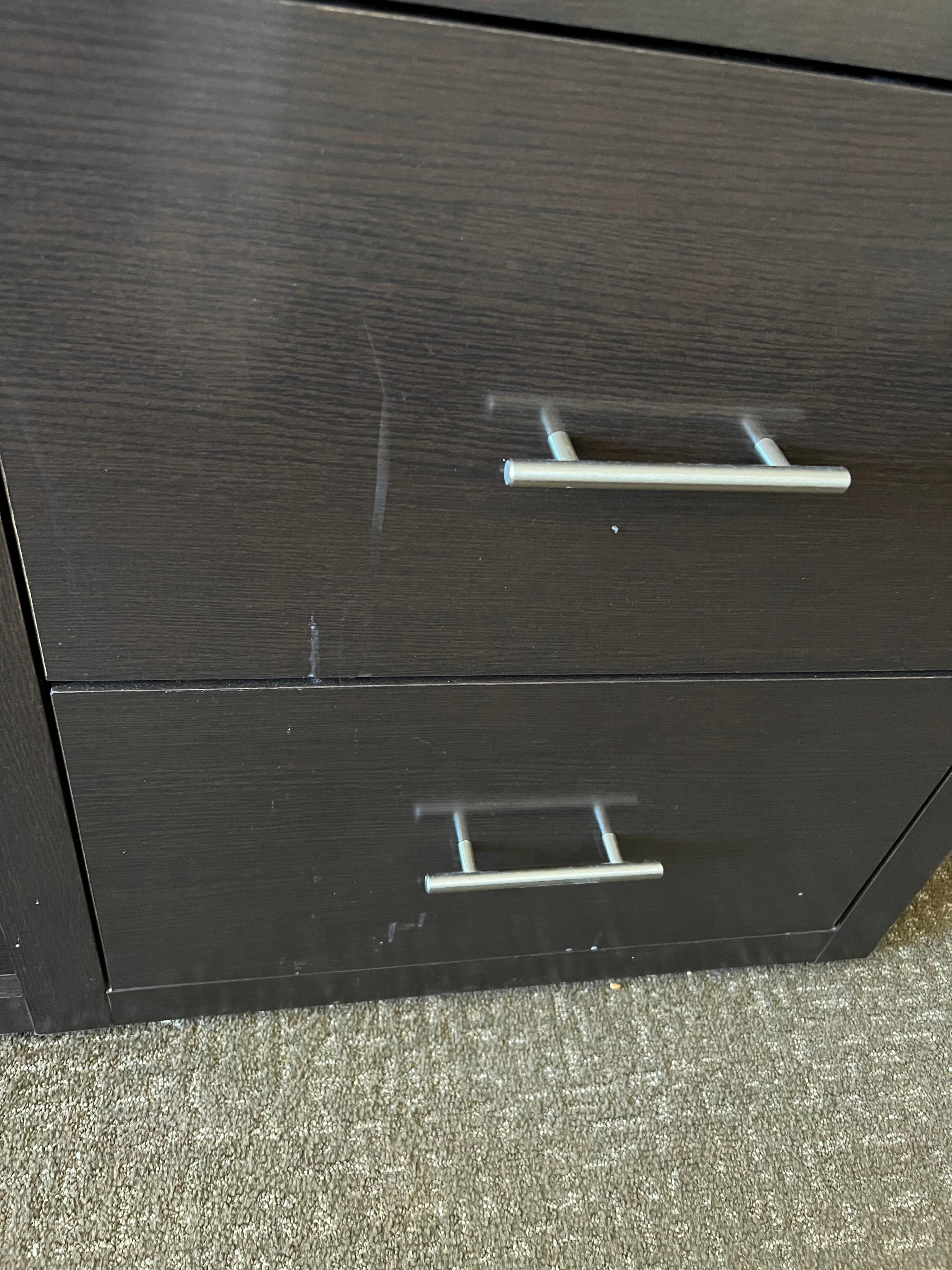 Dirty dresser drawers, needed wiping down.