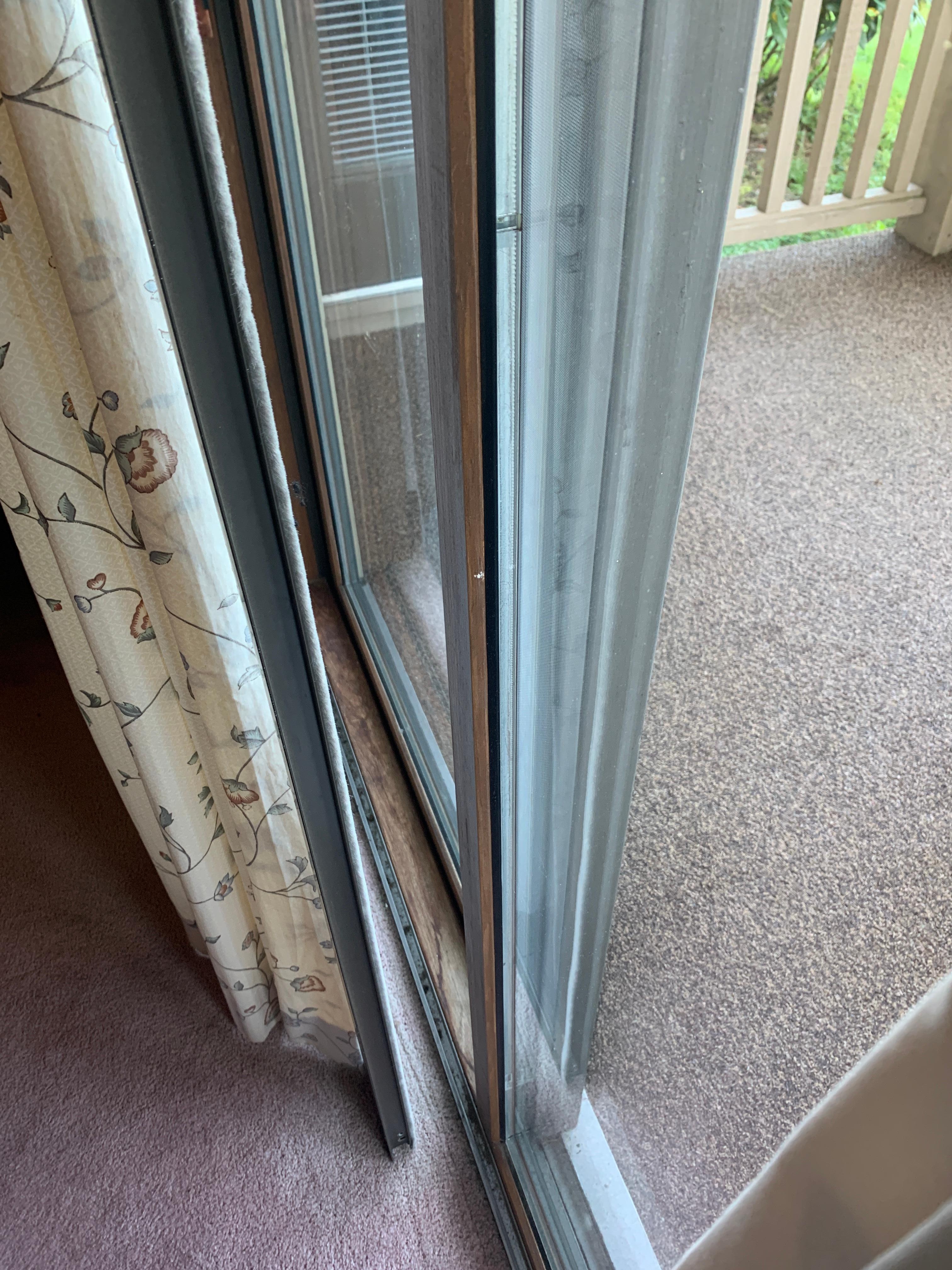 Screen door out of track; leaning