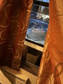 Single pane window is low and makes room unsafe.