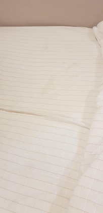Bodily fluid stains on the bedsheets
