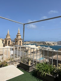 Rooftop terrace with sea view.