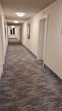 Couloir ďaccès aux chambres