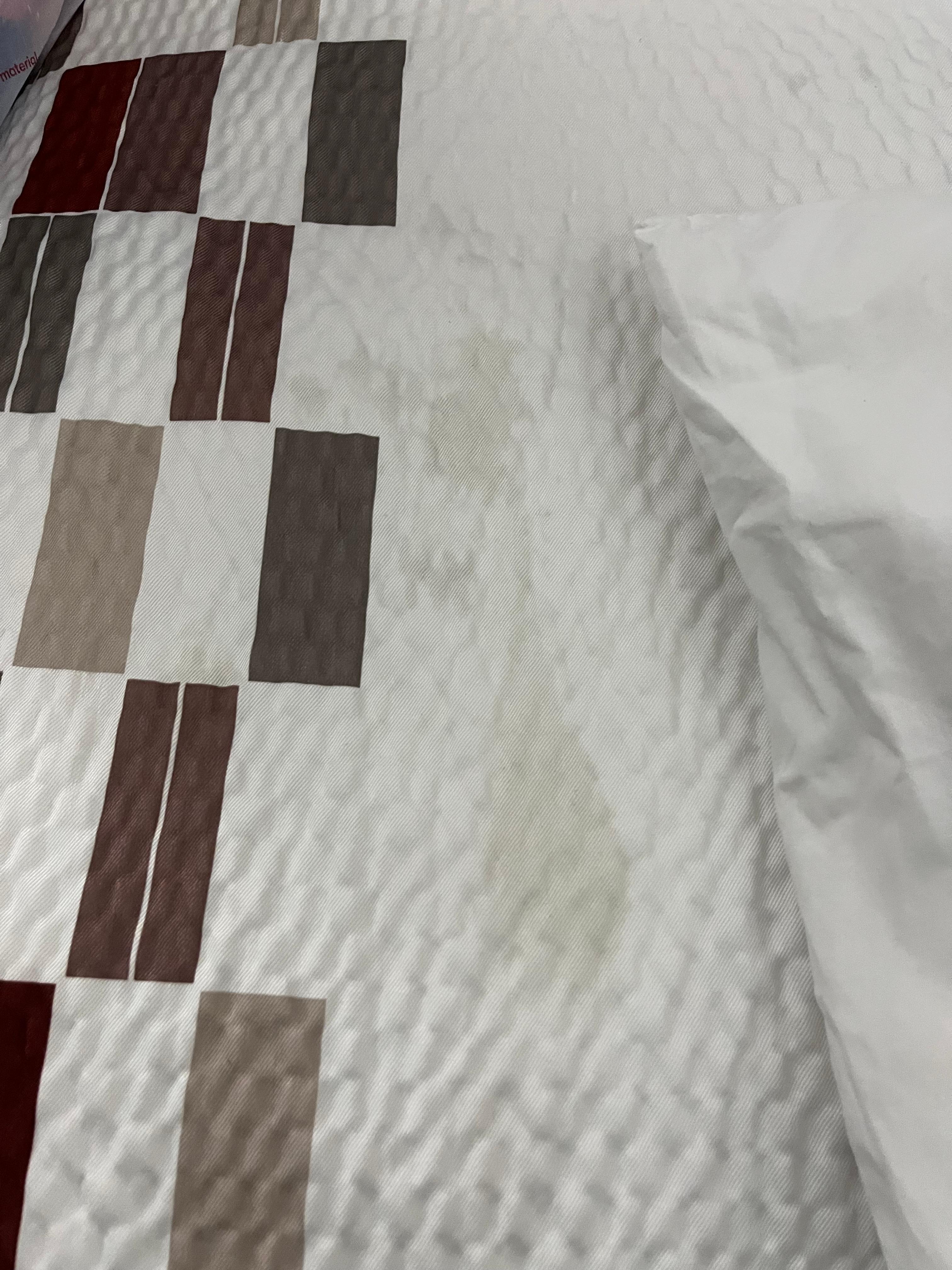 Stain on comforter.