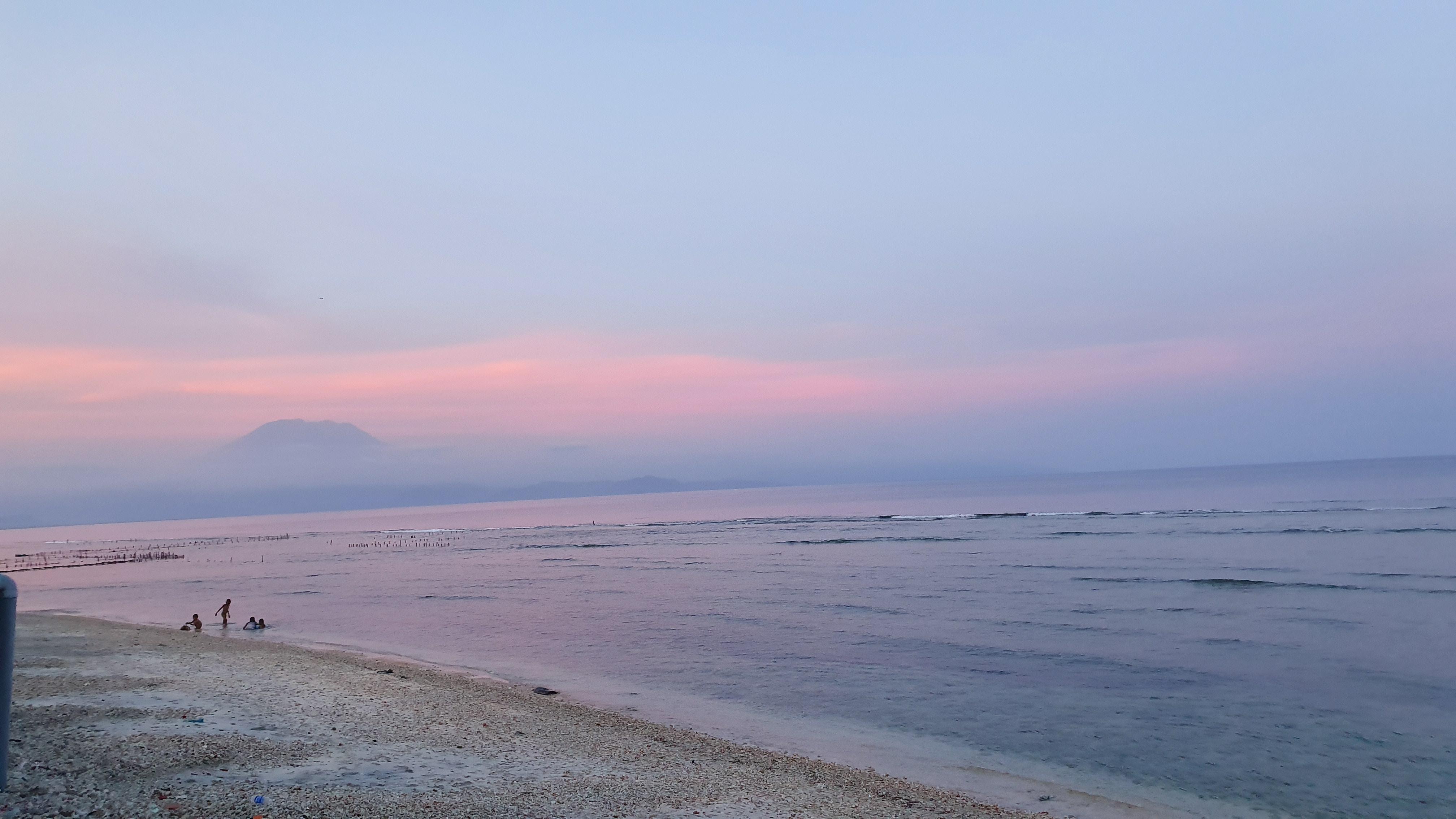 Sunset view of Mount Agung as seen from the inn beachfront. Beautiful