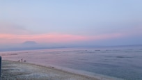 Sunset view of Mount Agung as seen from the inn beachfront. Beautiful
