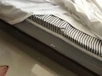 Metal poking out of bed