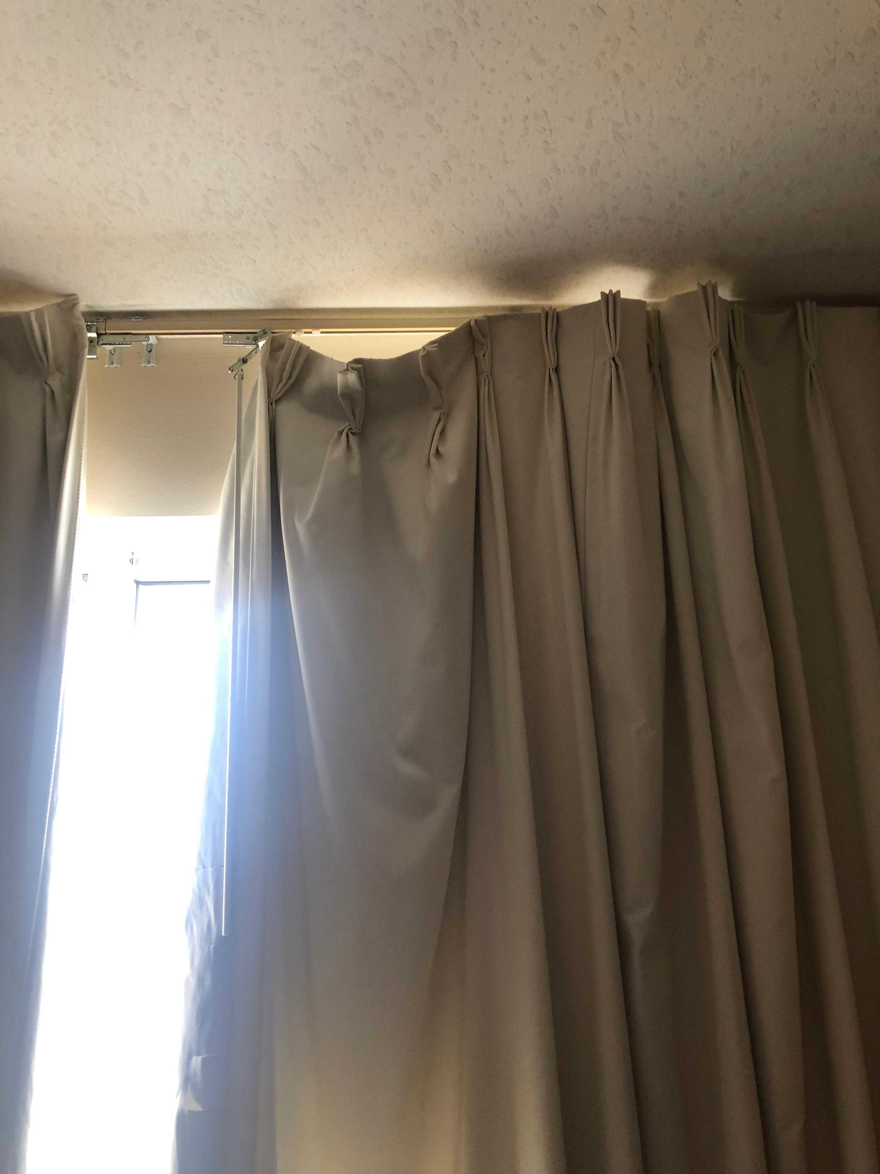 Curtains off track in master bedroom