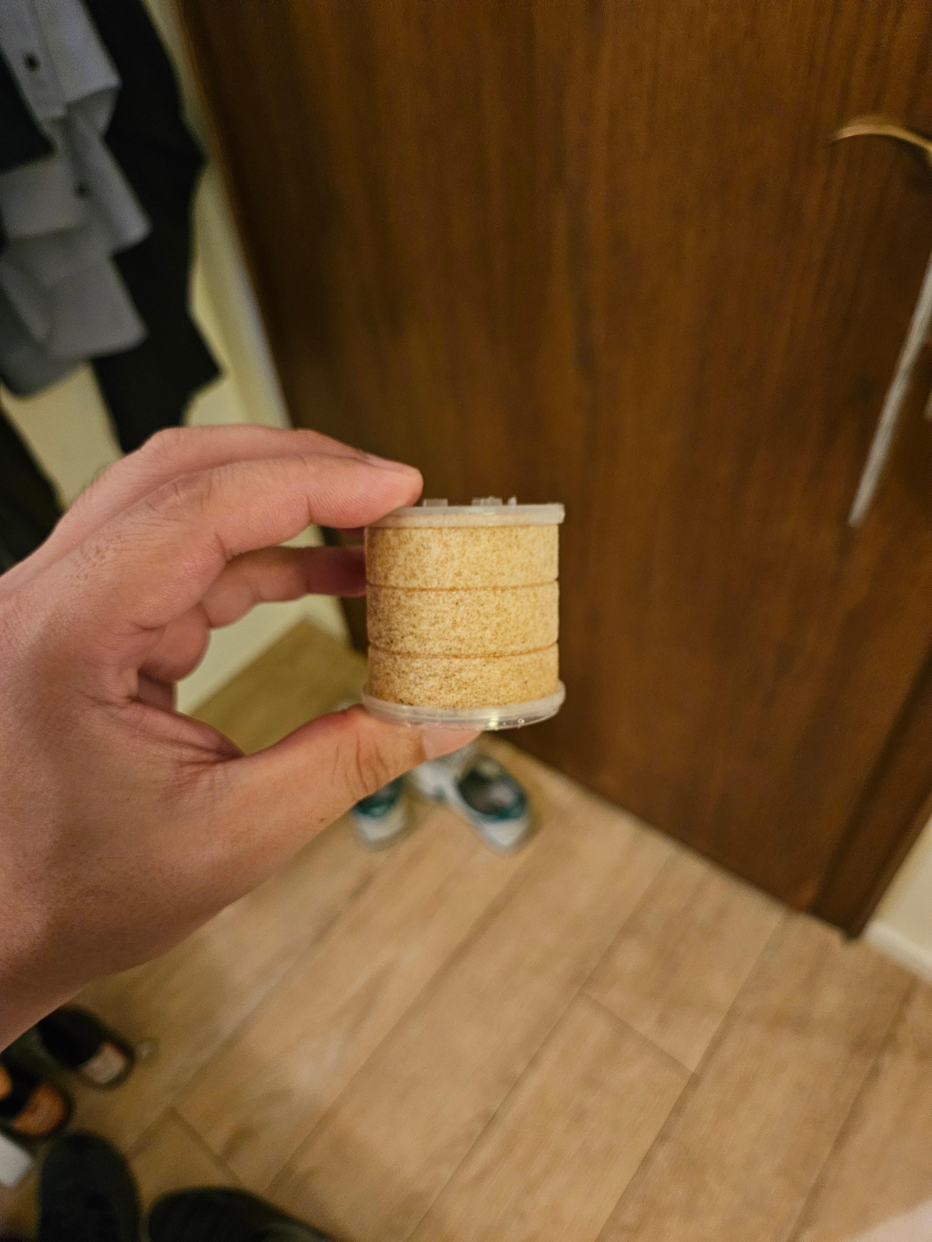 I use a travel shower head with a filter and at first it was pure white and then it changed to this.