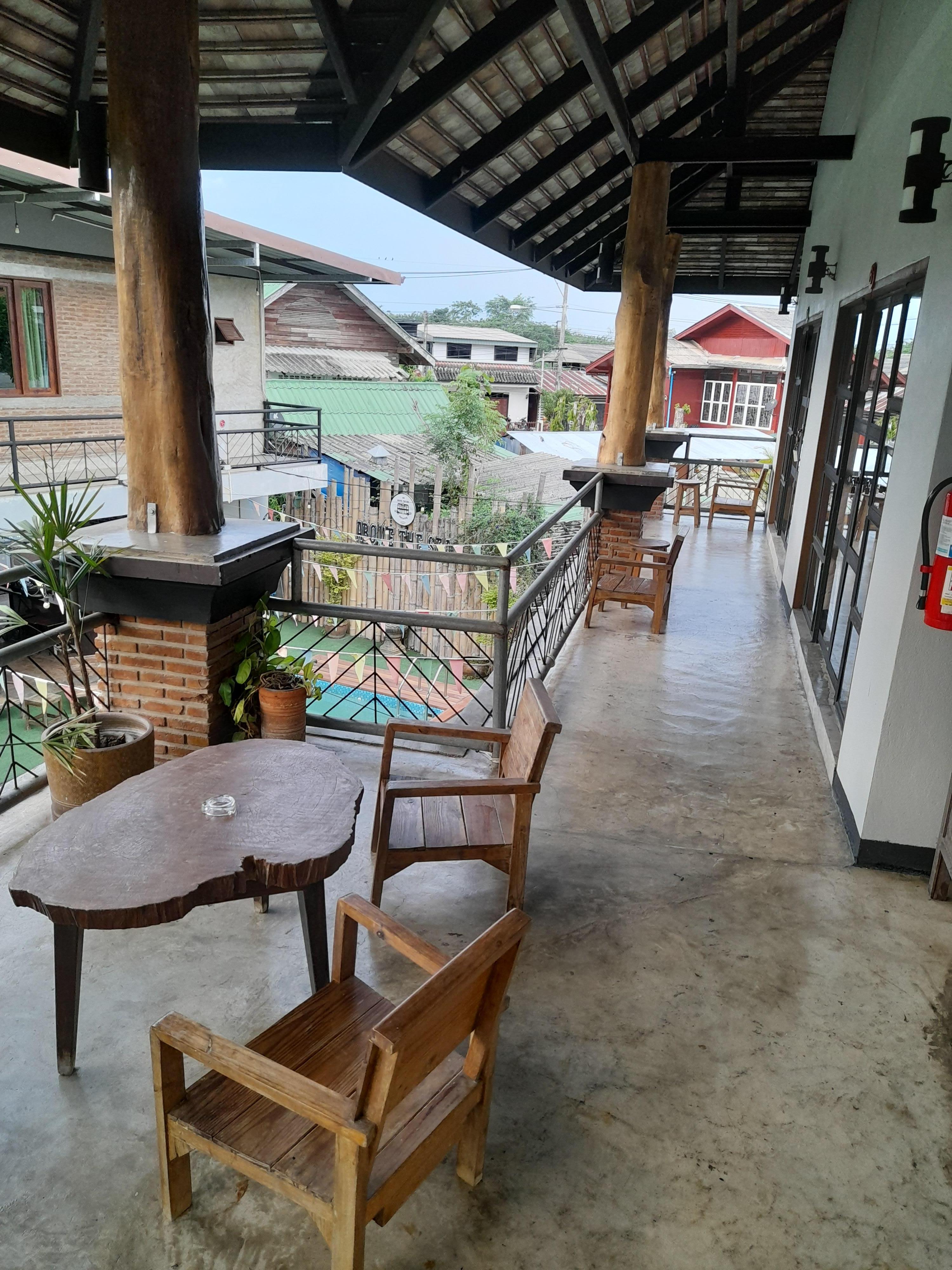 Corridor / Smoking area with pool view