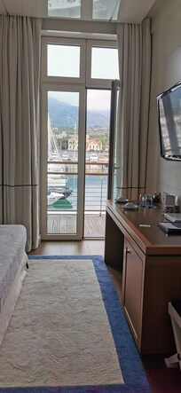 Two double doors onto balcony.