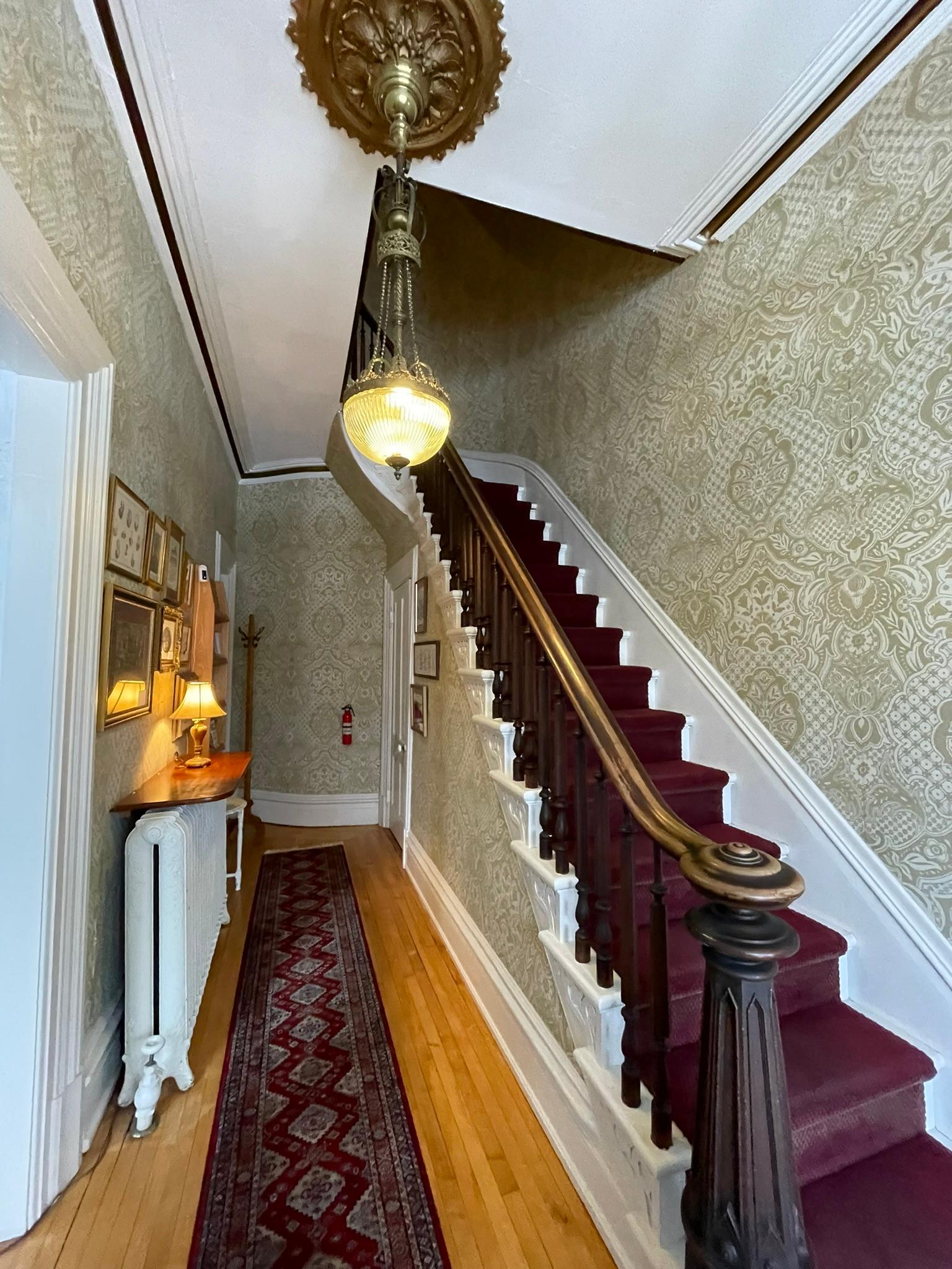 Entryway and stairs to rooms