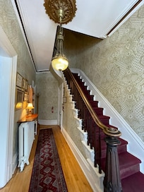 Entryway and stairs to rooms