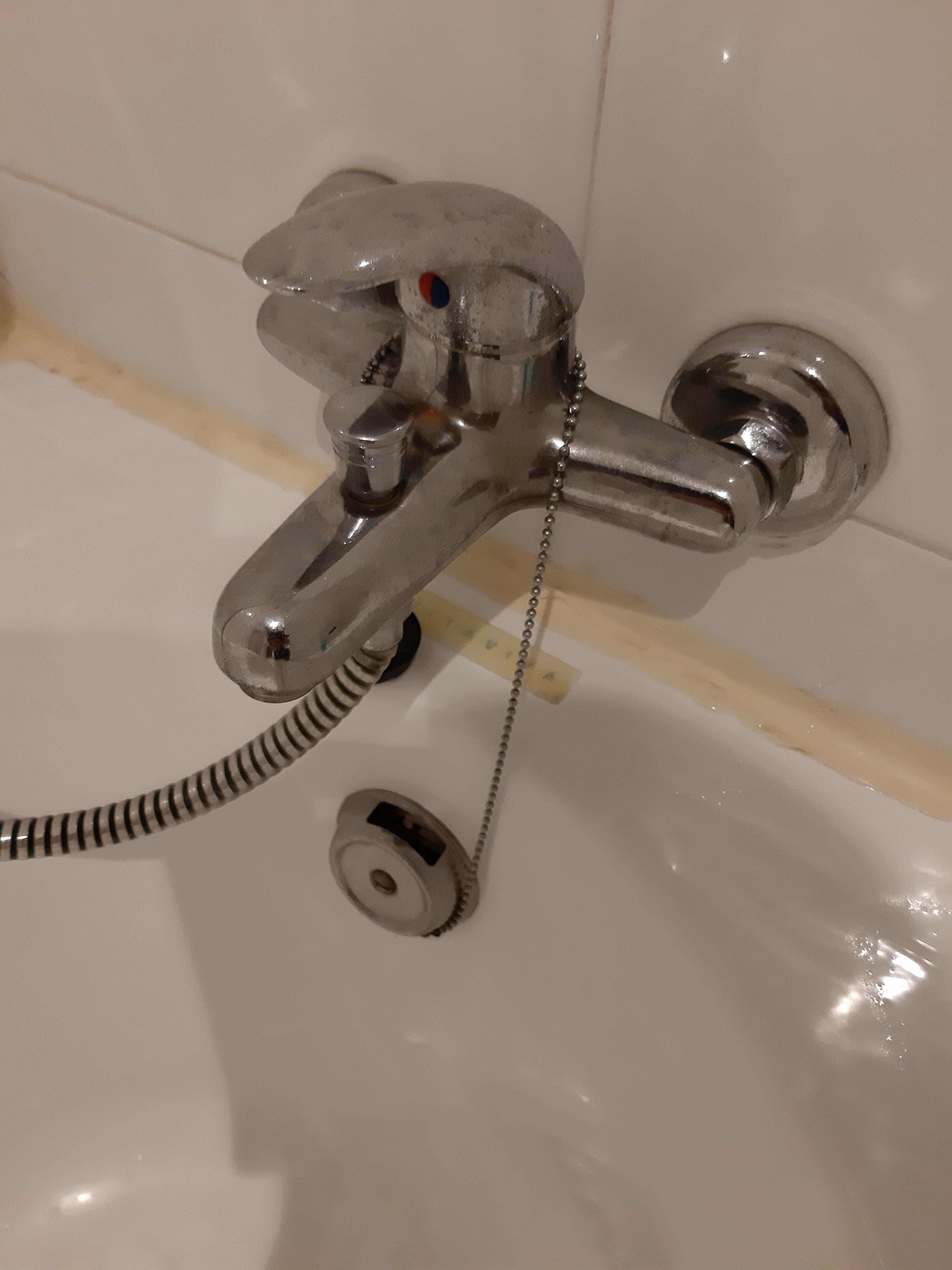 The knob of the shower faucet that was stuck