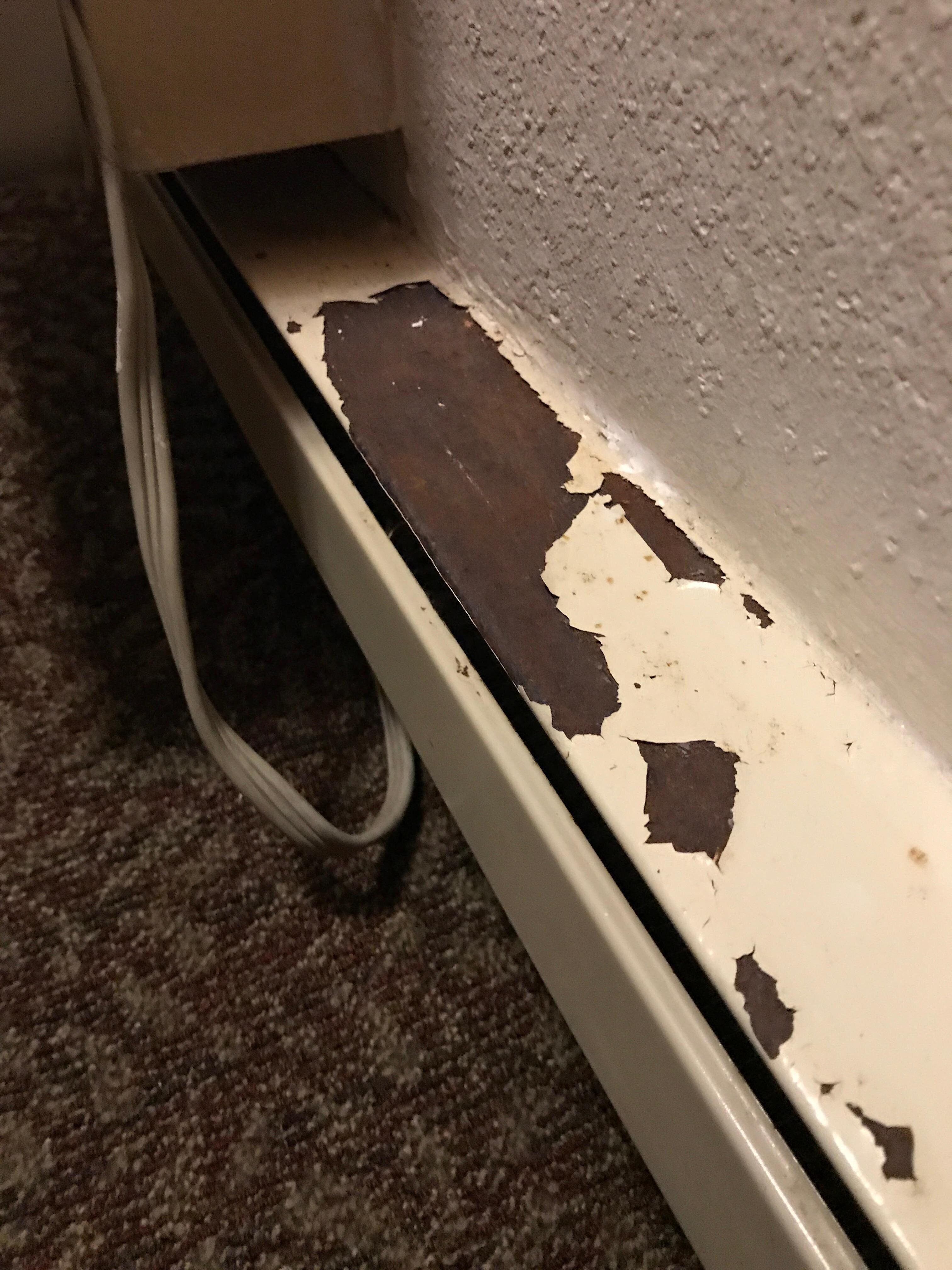 Chipped, rustiness near air conditioner