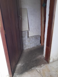 Passagem entre garagem e quartos