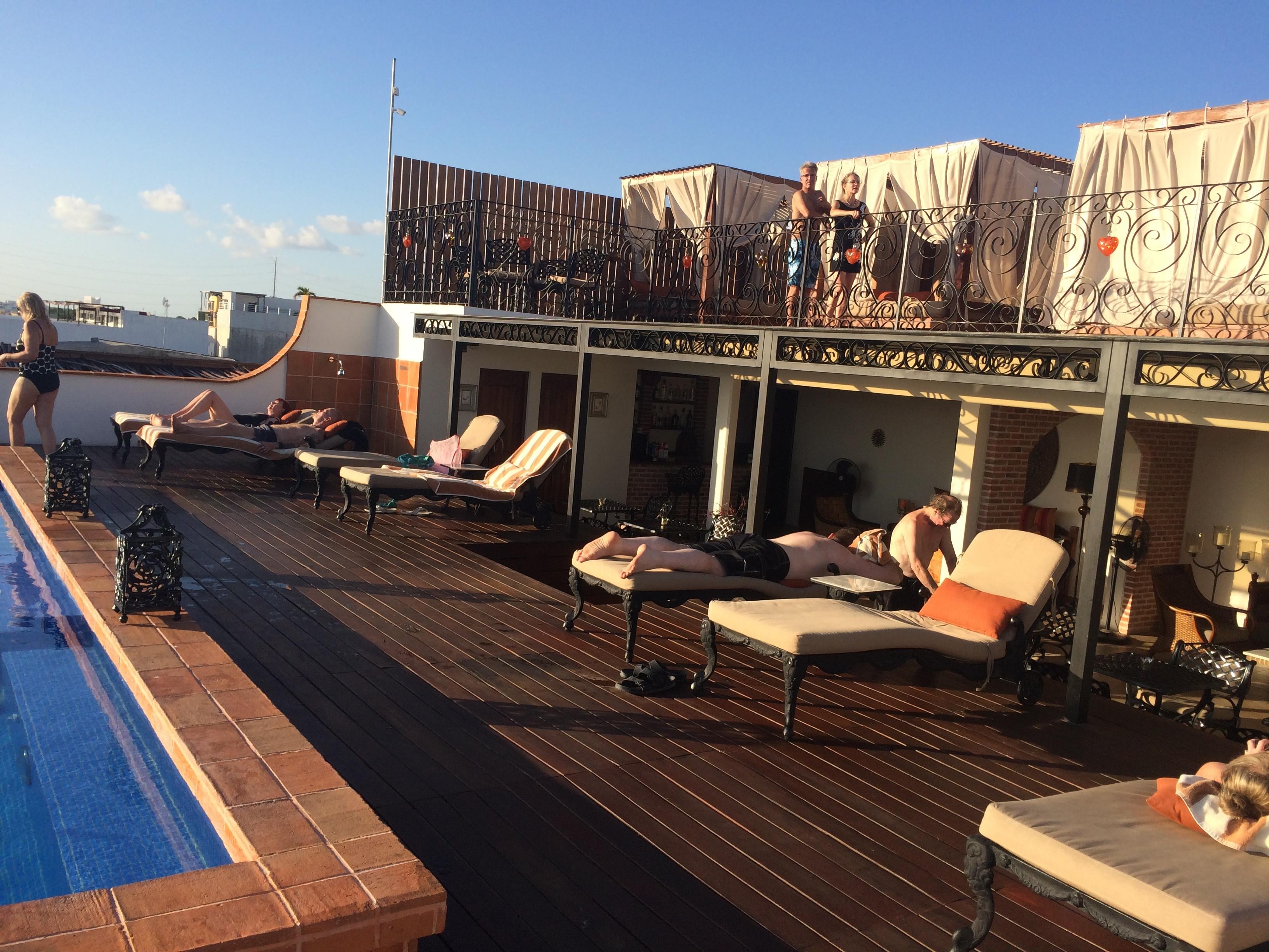 Roof top pool and lounge area.