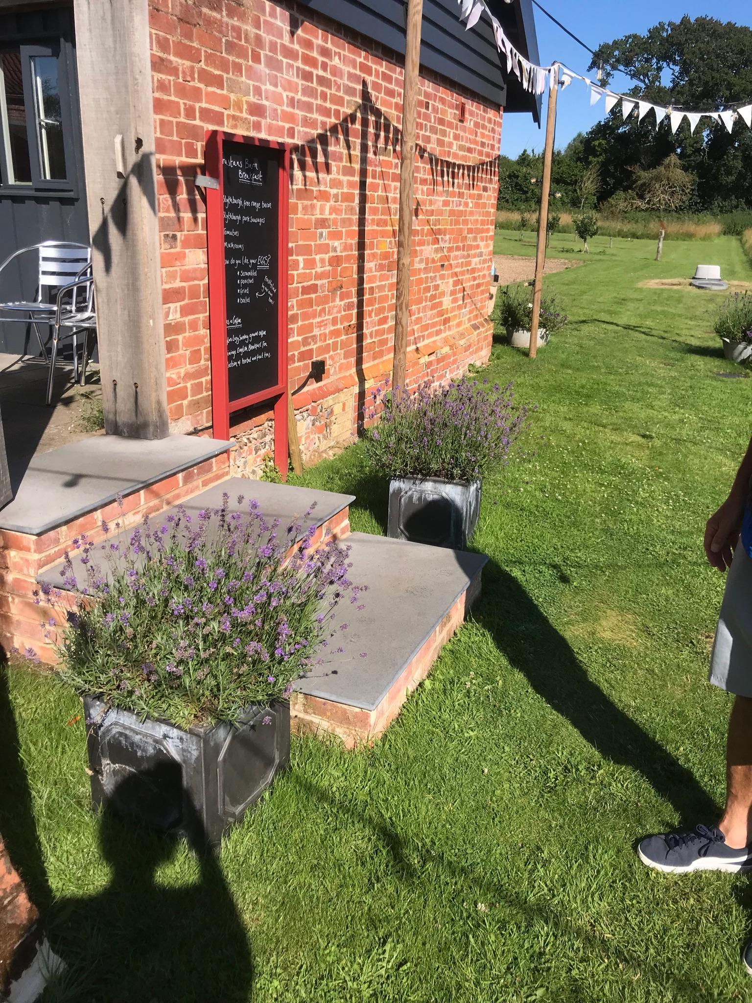 Entrance to the walled garden and breakfast menu chalk board