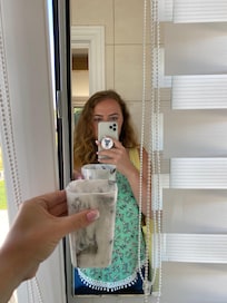 Size of the bathroom mirror compared to the toothbrush holder partially obstructed by the window blind. I’m stood by the other wall, husband didn’t see his full face when shaving