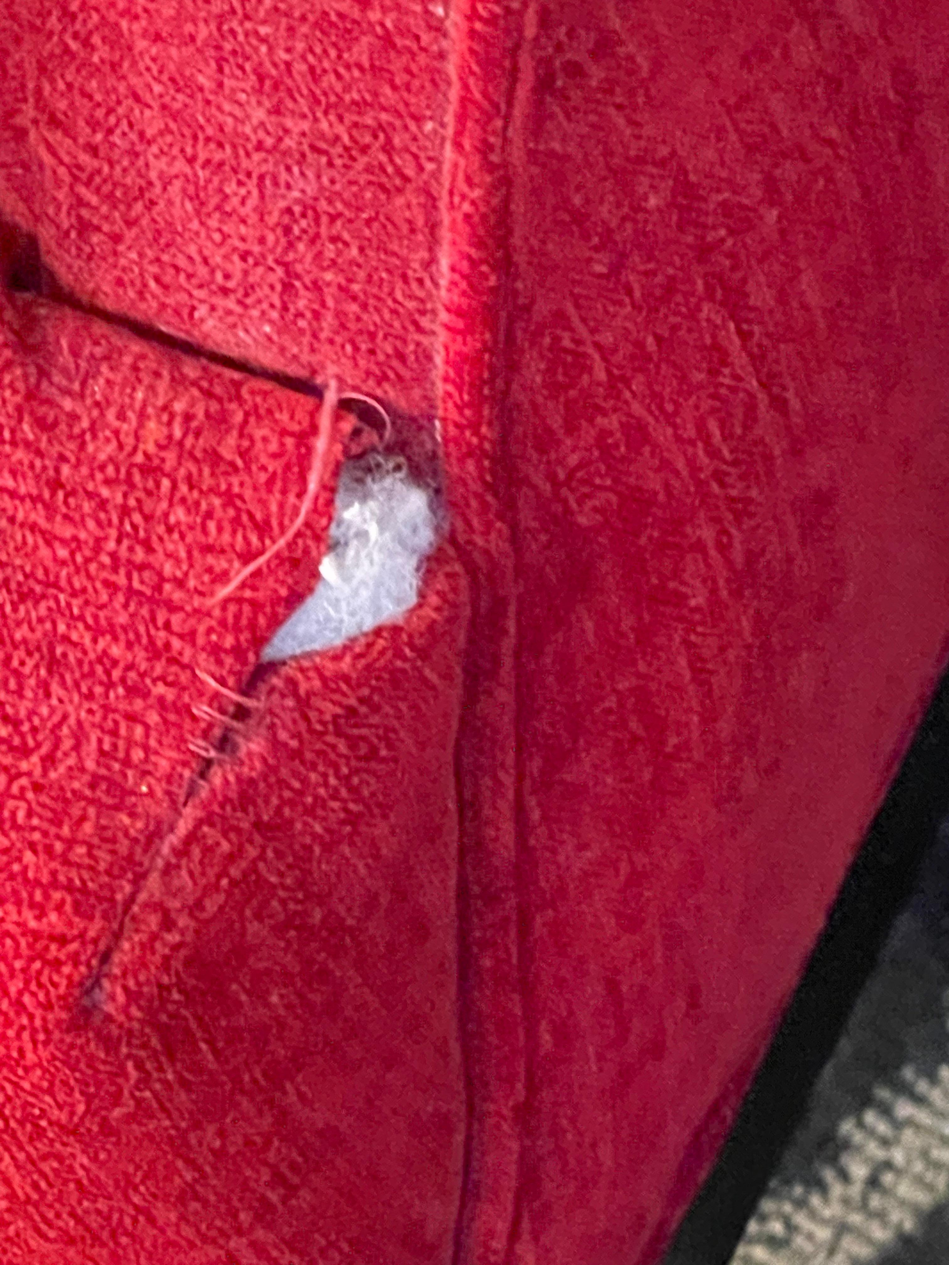 Ripped chair in room