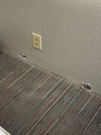 Holes left in the wall from moving a/c unit during remodel, but weren’t patched.