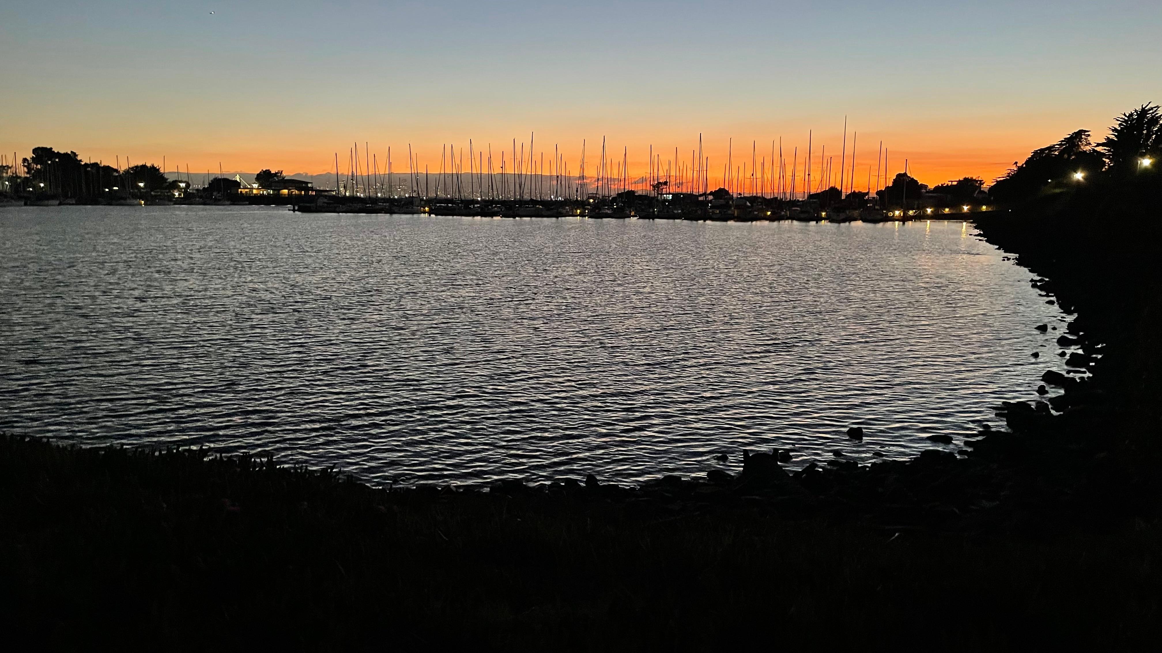 Sunset across the bay from path.