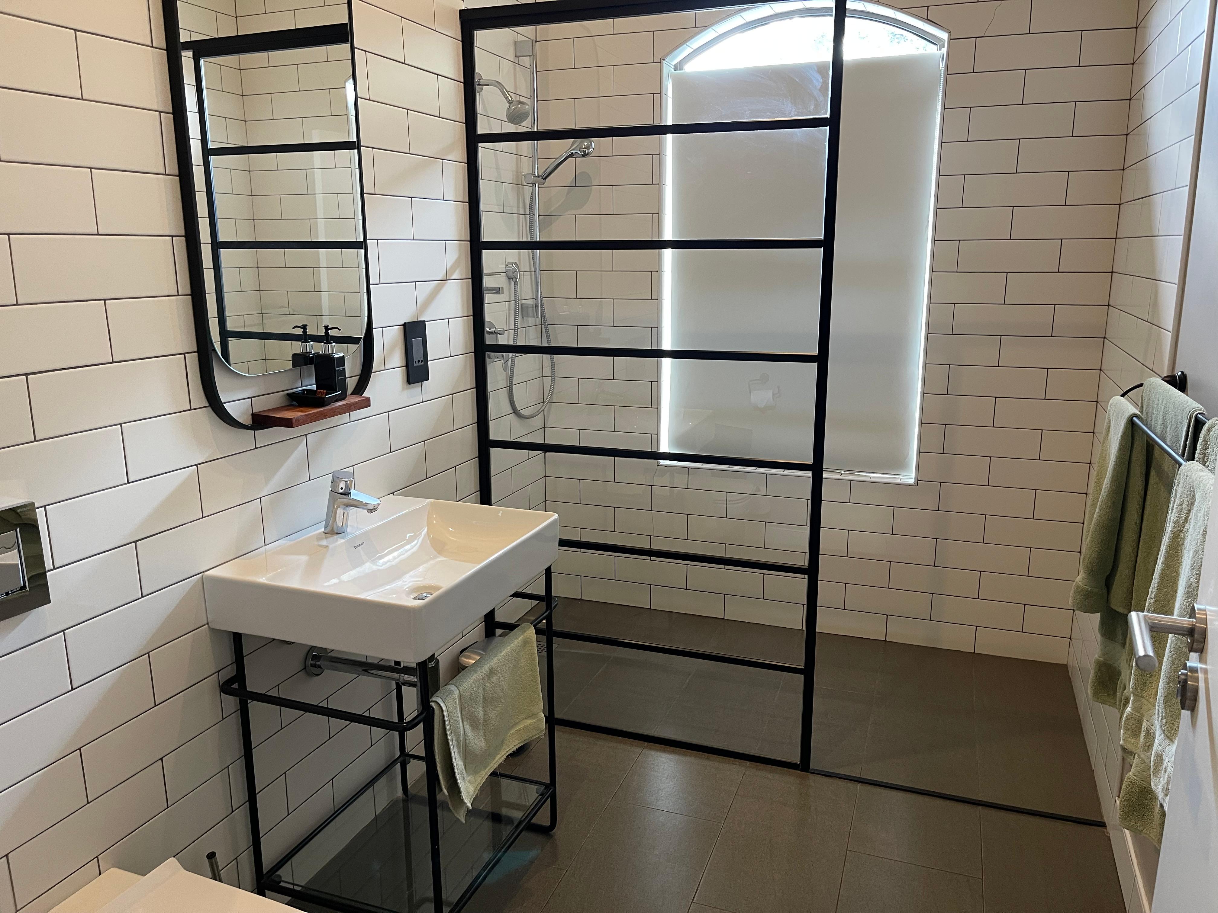 Large Bathroom with shower and a view to the “farm” area. 