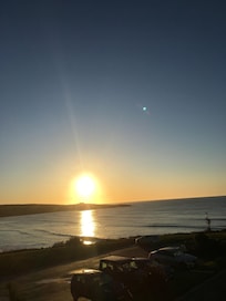 Sun coming up from balcony