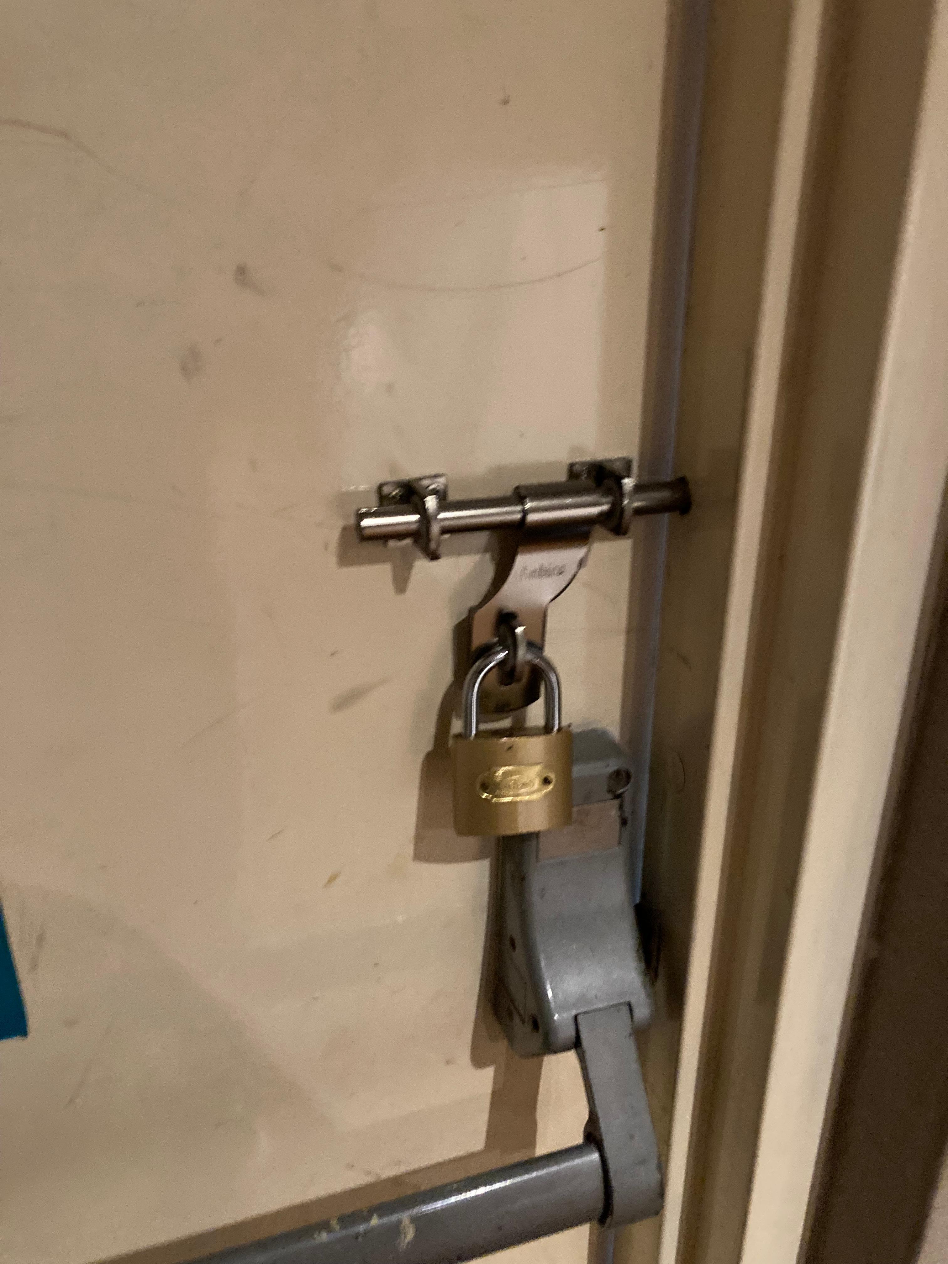 Fire escape door padlocked shut