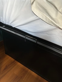 Metal pedestal with sharp edges.