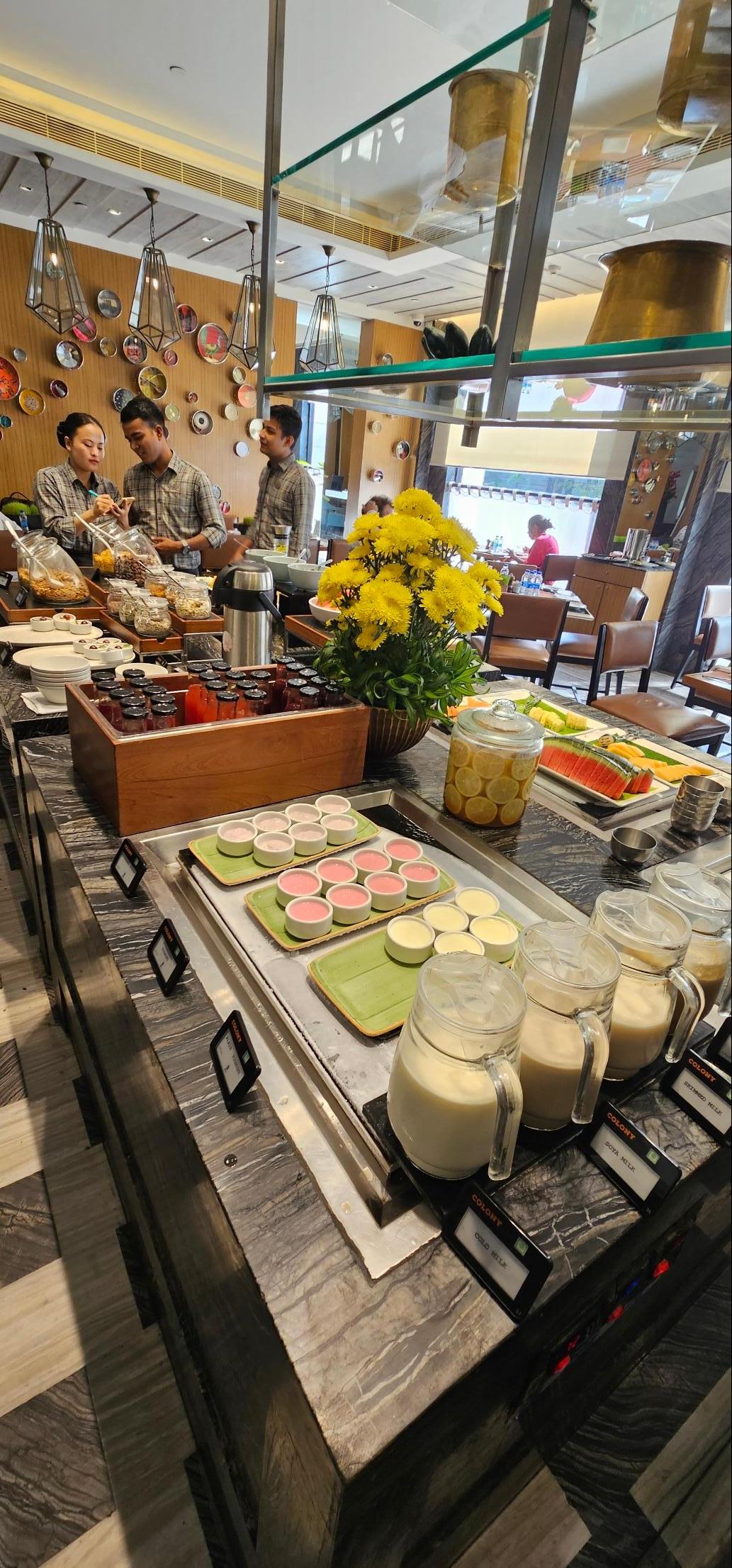 Breakfast buffet (cereal, yogurt, nuts, fresh fruit, and fresh fruit juices)