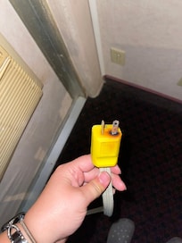 The fried/melted A/C plug