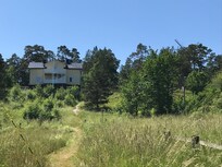 Kvarnvillan, annex till hotellet. Man skymtar kvarnen som gett namn till byggnaden.