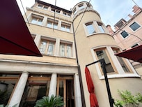 Sitting in the rear garden having coffee