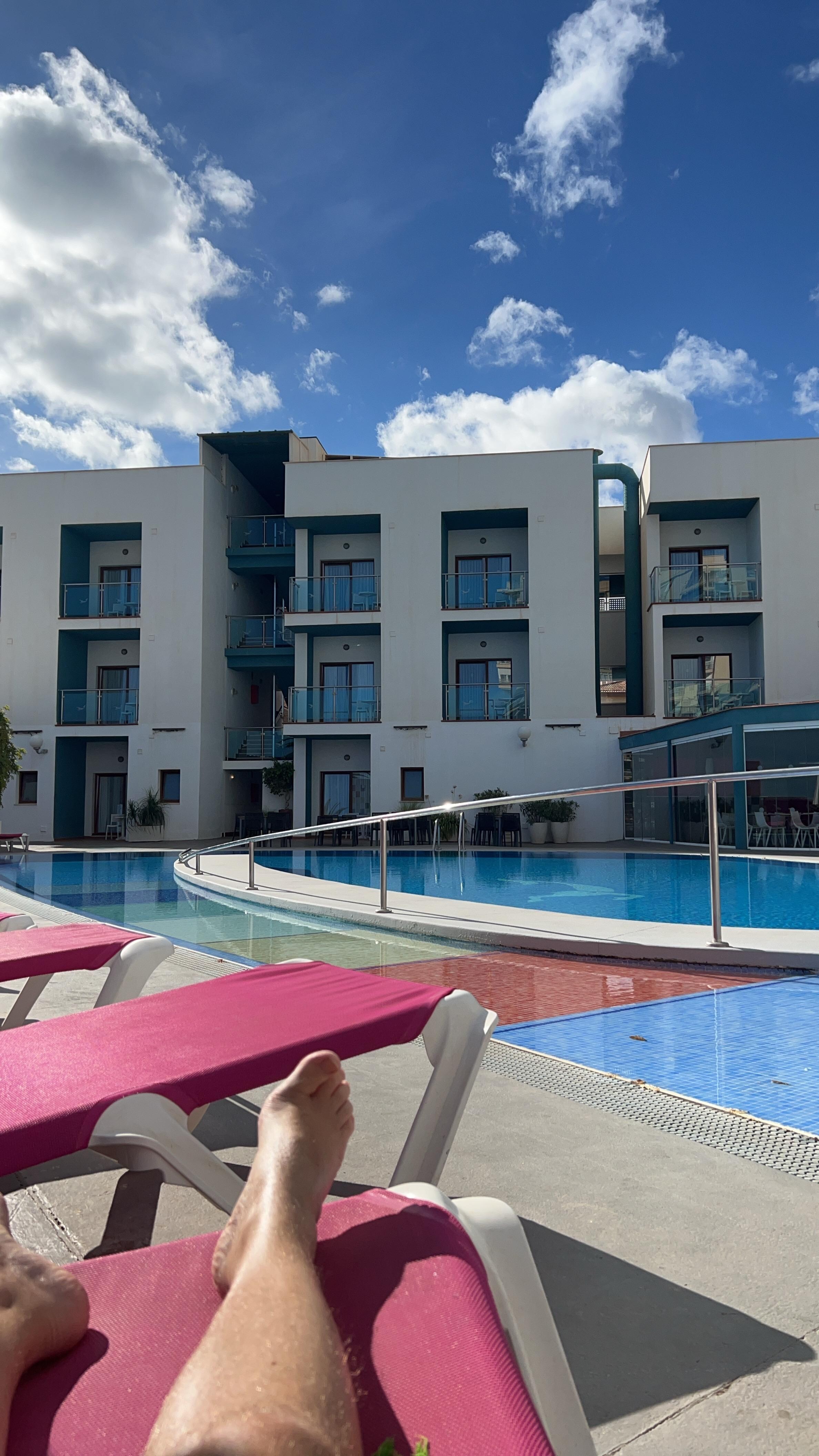 Relaxing by the large pool 