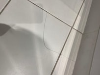 Bathroom floor tiles cracked