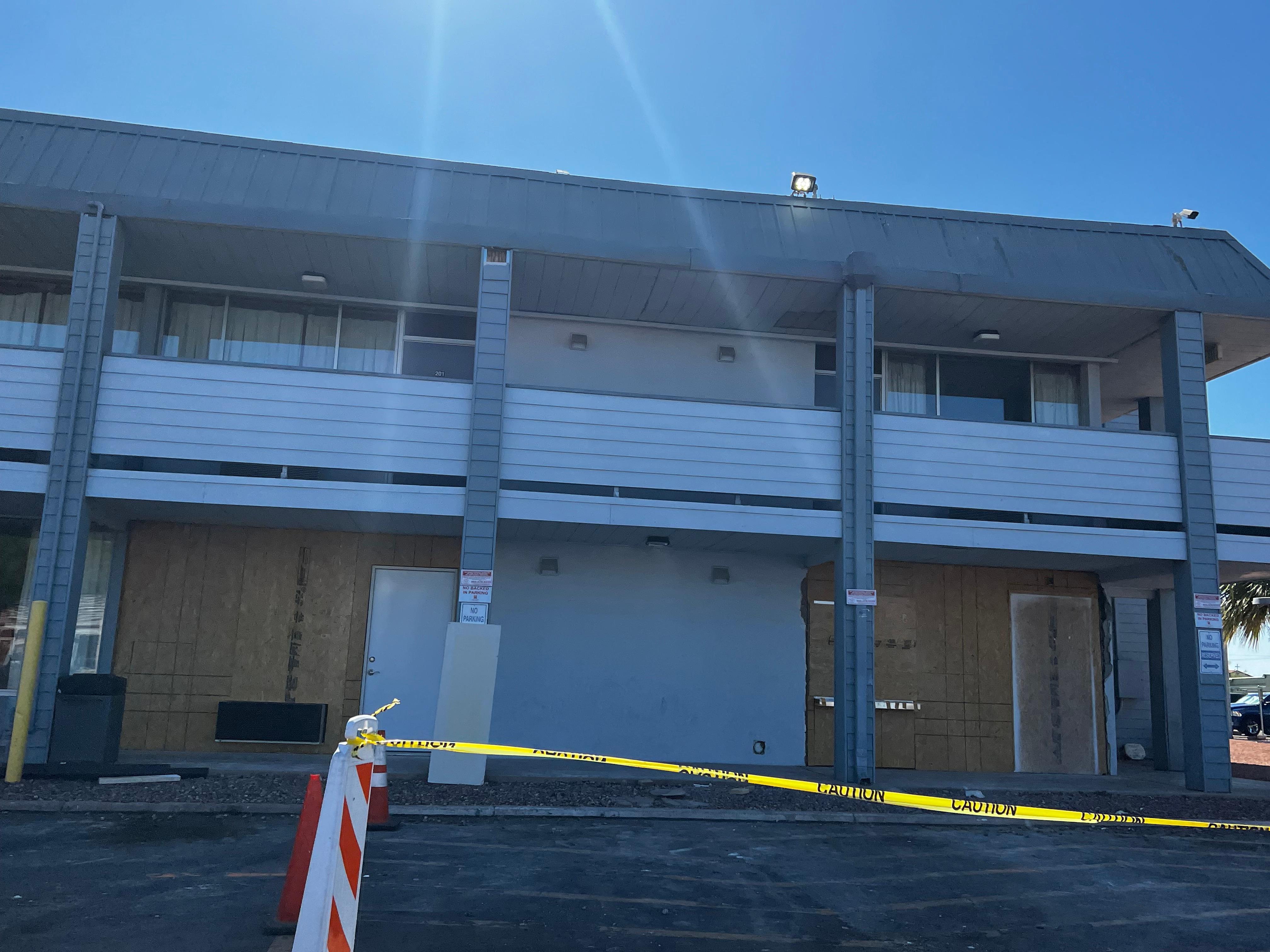 One of many areas boarded off… under renovations or cleaning up from a crime? You decide.