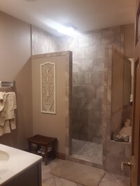 Very nice and roomy bathroom with shower, jet tub and double sink.