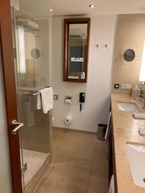 Bathroom with rain shower and double sink