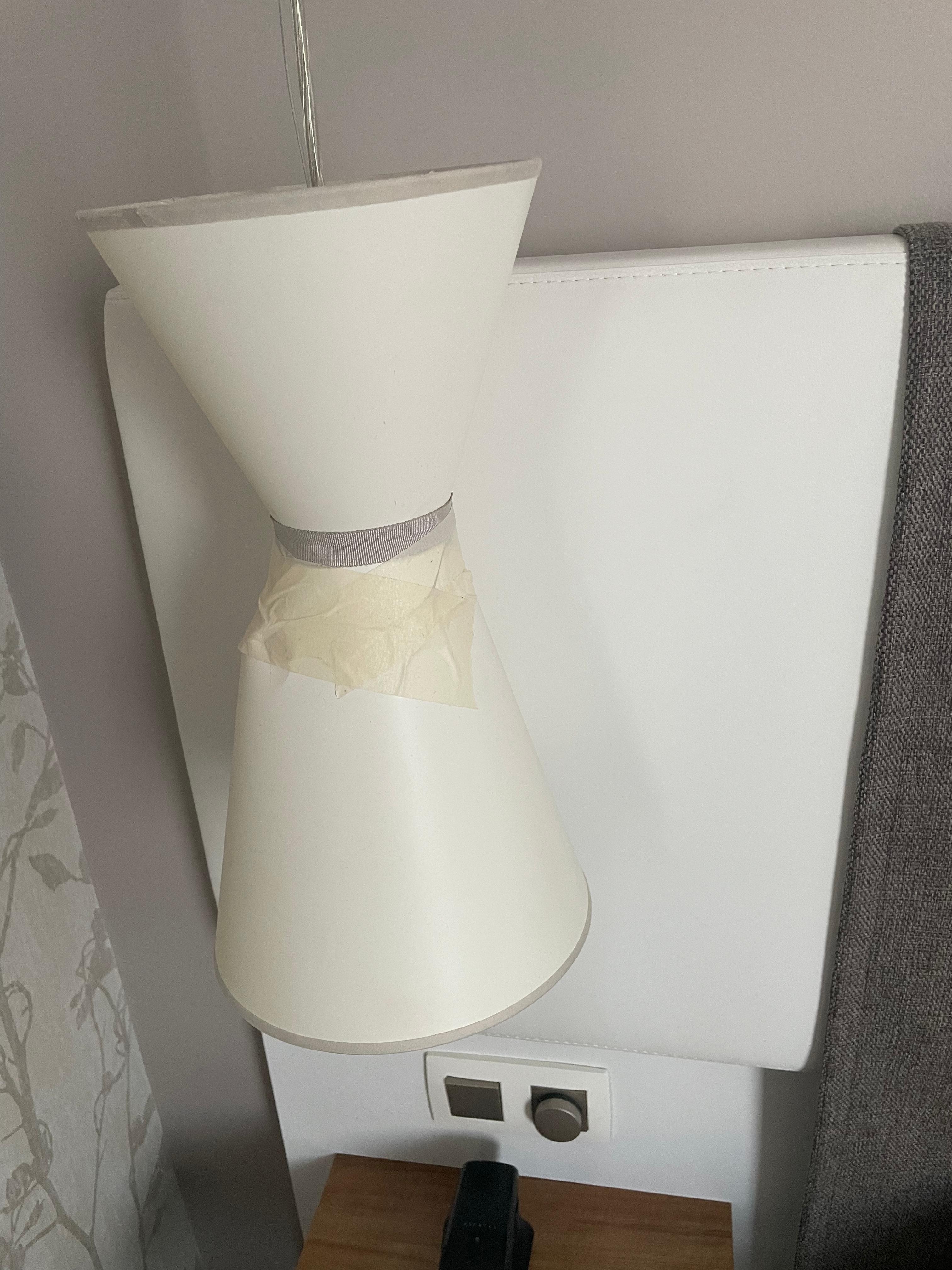 Lampshade held together by tape