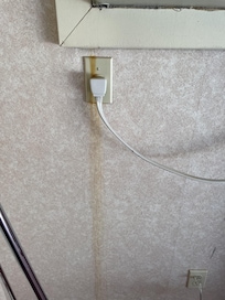 beneath the loud heating / air conditioning unit