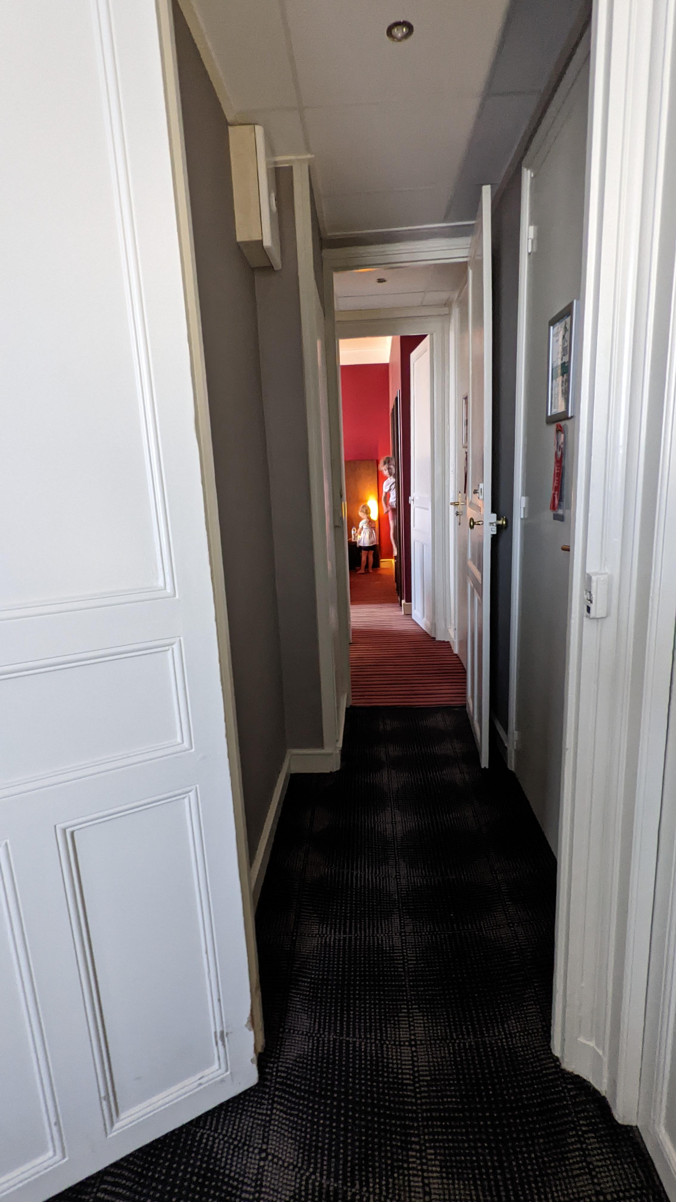 Adjoining corridor view to Room 117