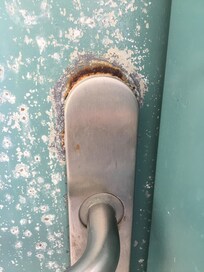 Poor condition of door into apartment