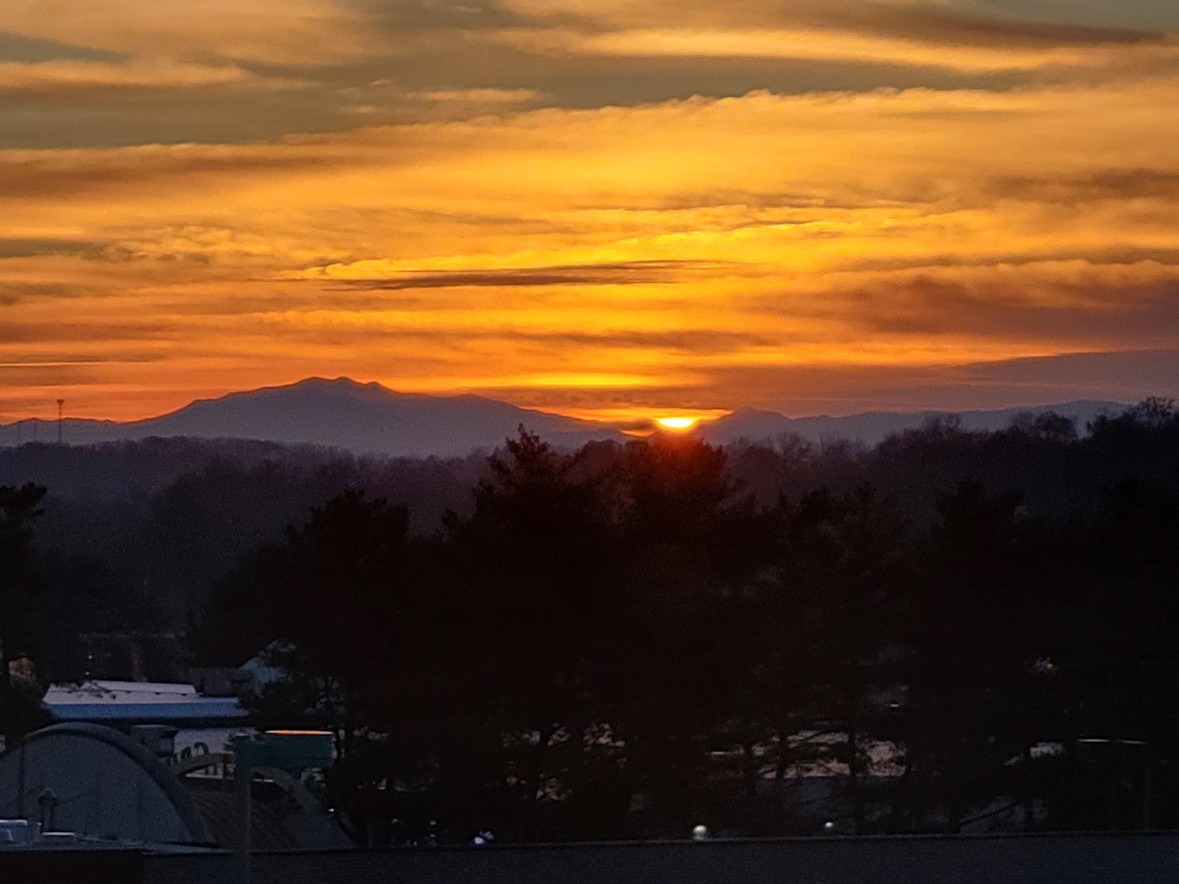 Smokie sunrise from our window.